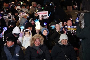 Thousands brave bitter cold to mark 1st anniversary of Yoon’s martial law